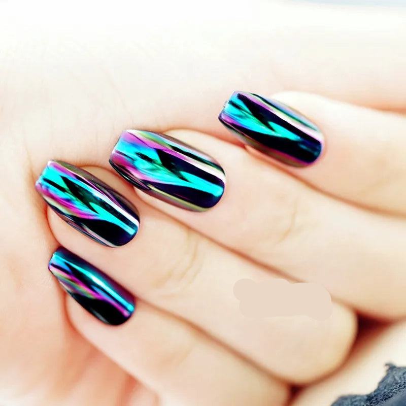 Nails with iridescent design on a light background.