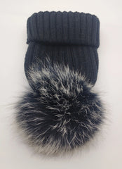 A woman wearing the hat while traveling, showcasing its versatility and portability.