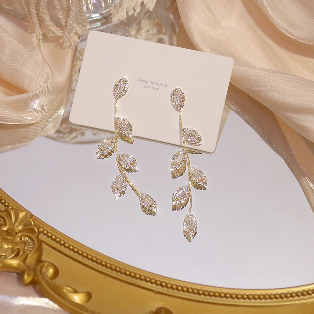 Gold leaf stud earrings

