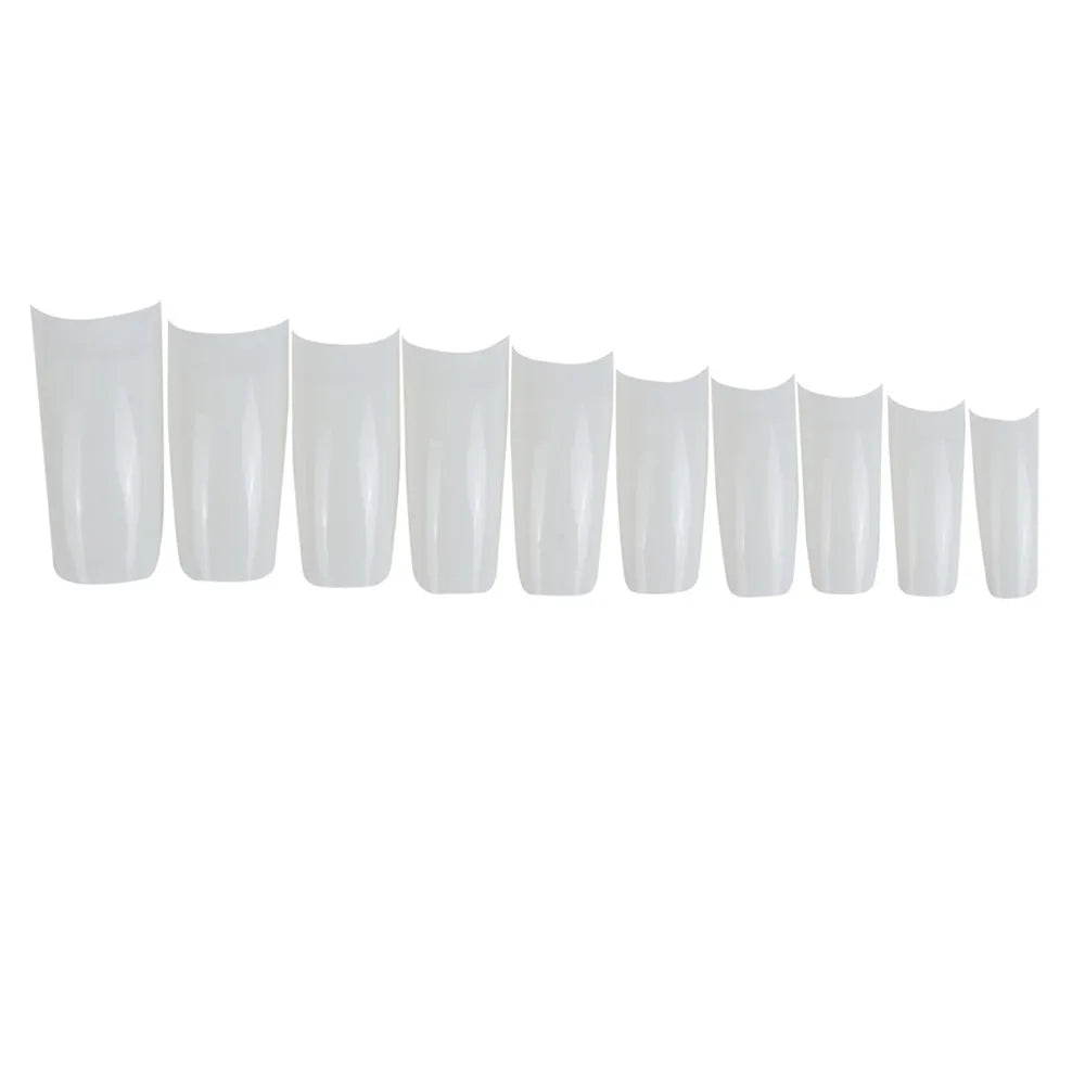 Row of white nail polish bottles on a white background