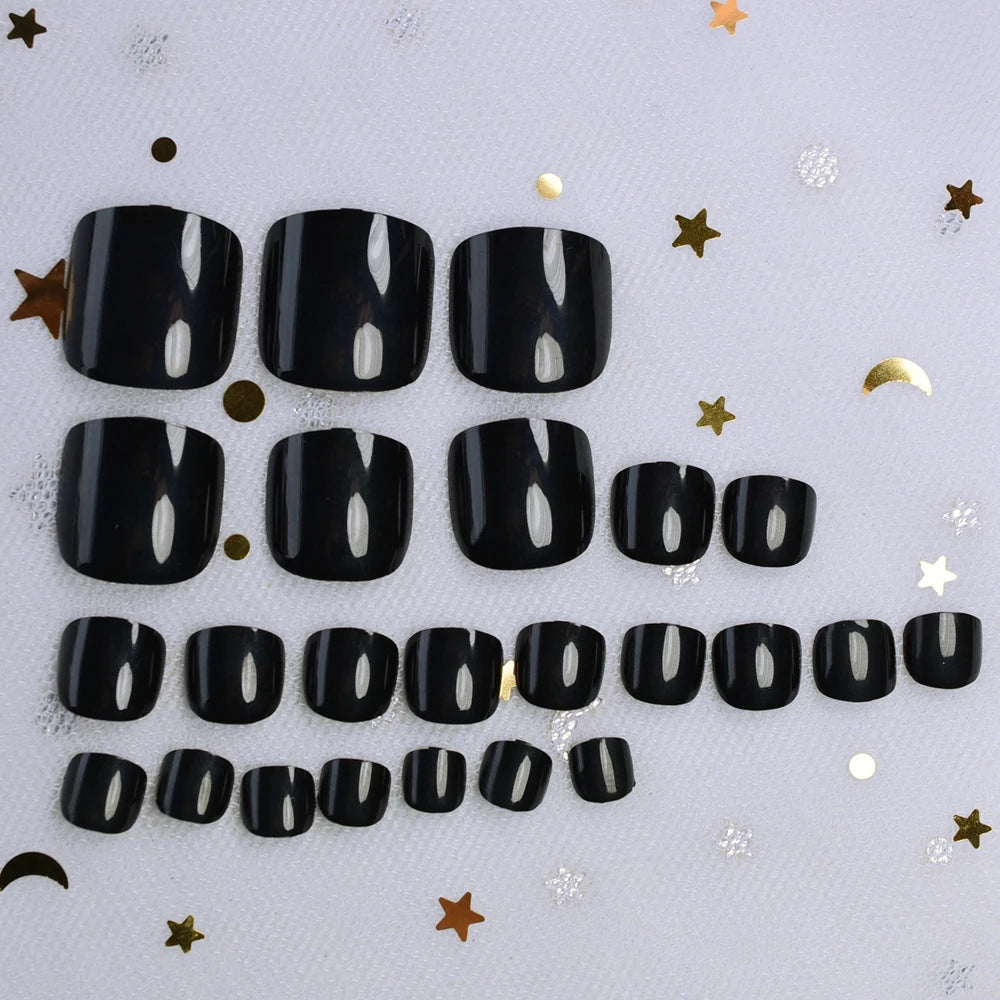 Black acrylic letters on a light gray background with decorative elements