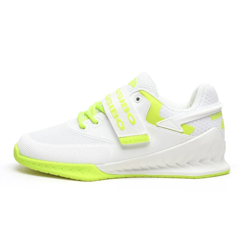 White and green athletic shoe on a white background