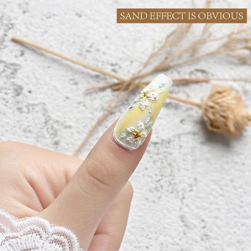 Nail with sand effect on a textured surface