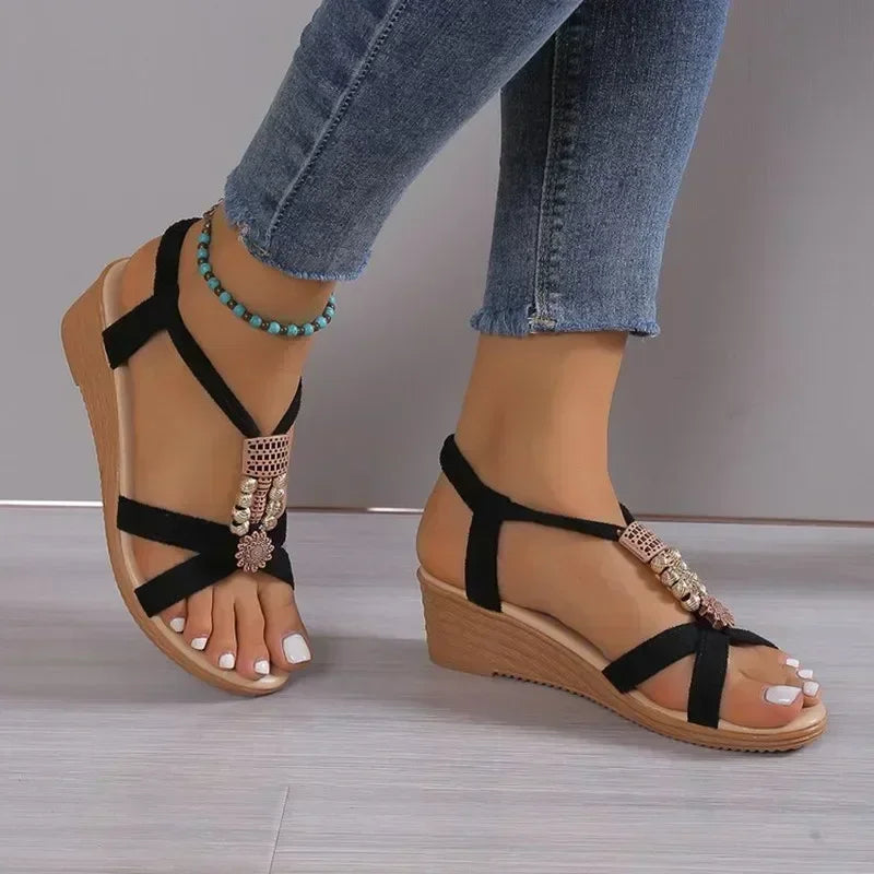 Round toe women’s sandals with metal decor

