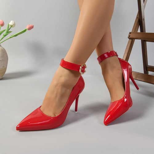 Red and black stiletto heels with metal belt buckle


