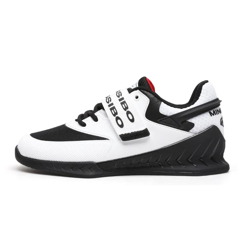 Black and white athletic shoe with visible branding on a white background