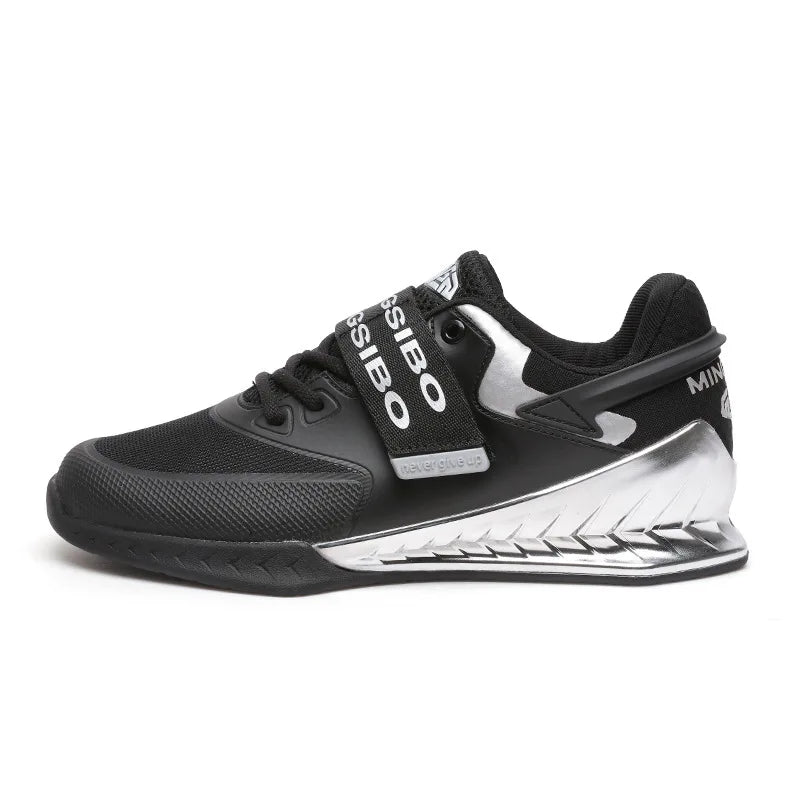 Black athletic shoe with visible branding on a white background