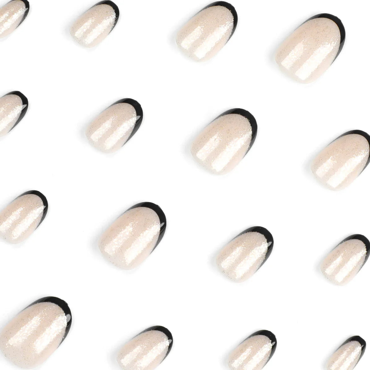 Pattern of beige nail polish with black tips on a white background