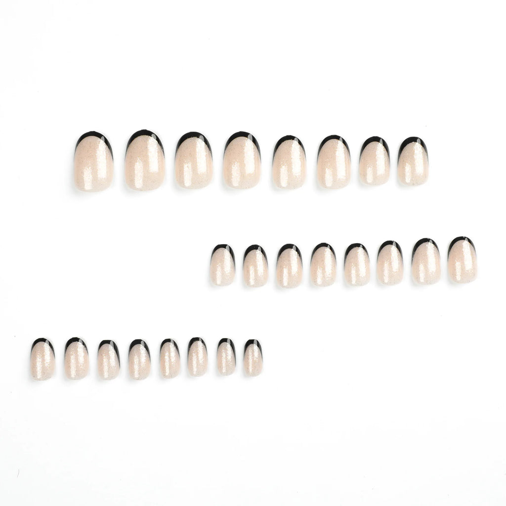 Set of nail extensions on a white background