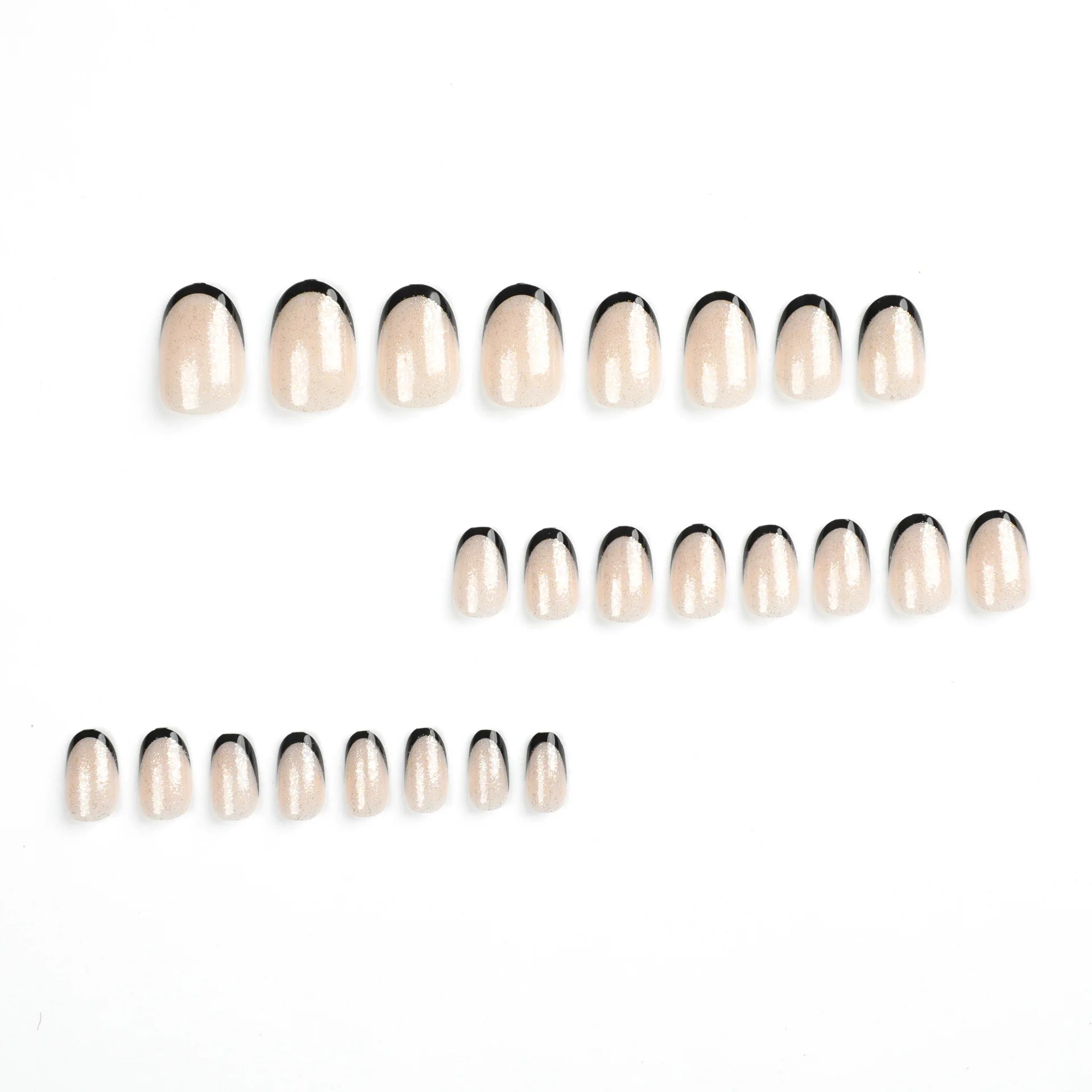 Set of nail extensions on a white background
