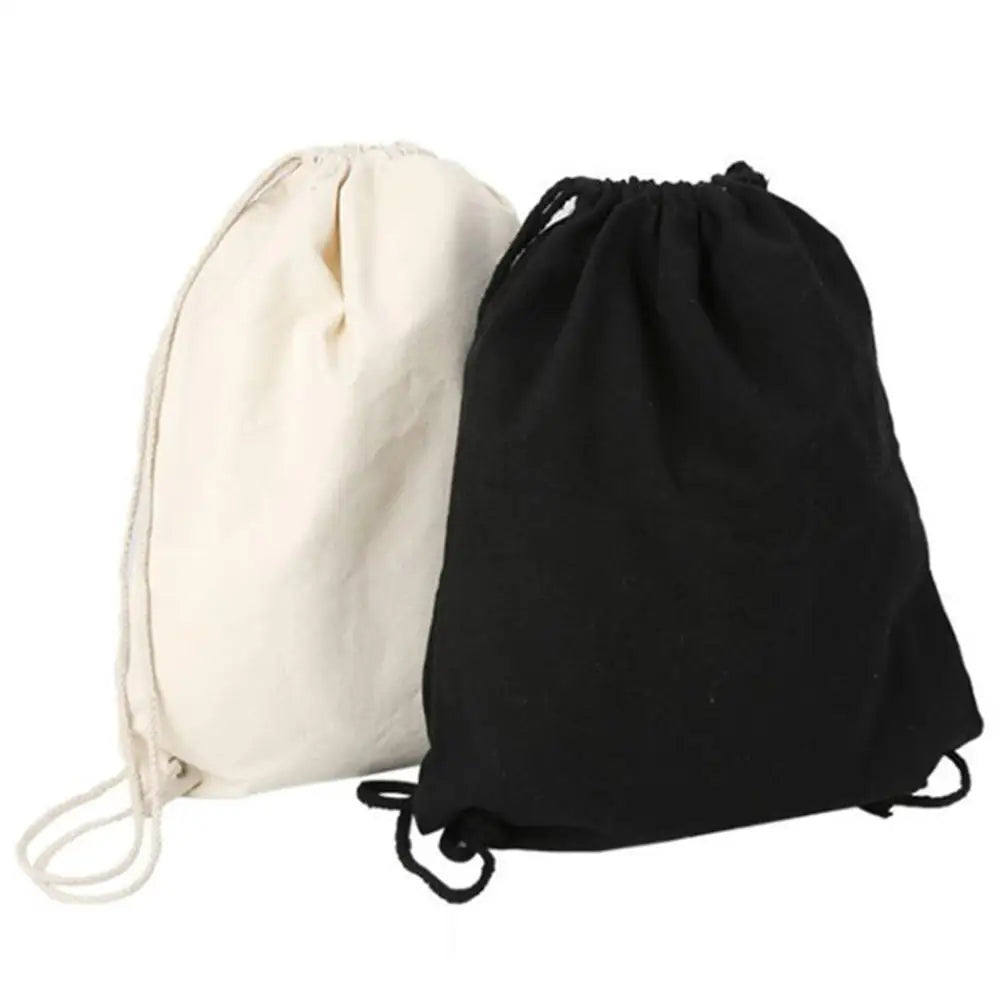 A person wearing the canvas backpack as a shoulder bag.

