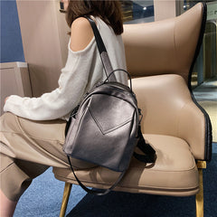 gray leather backpack